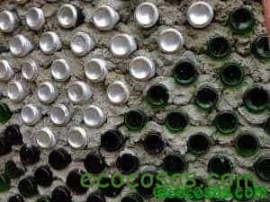 earthship-close-up-of-bottle-and-can-wall-prior-to-plastering-300x225